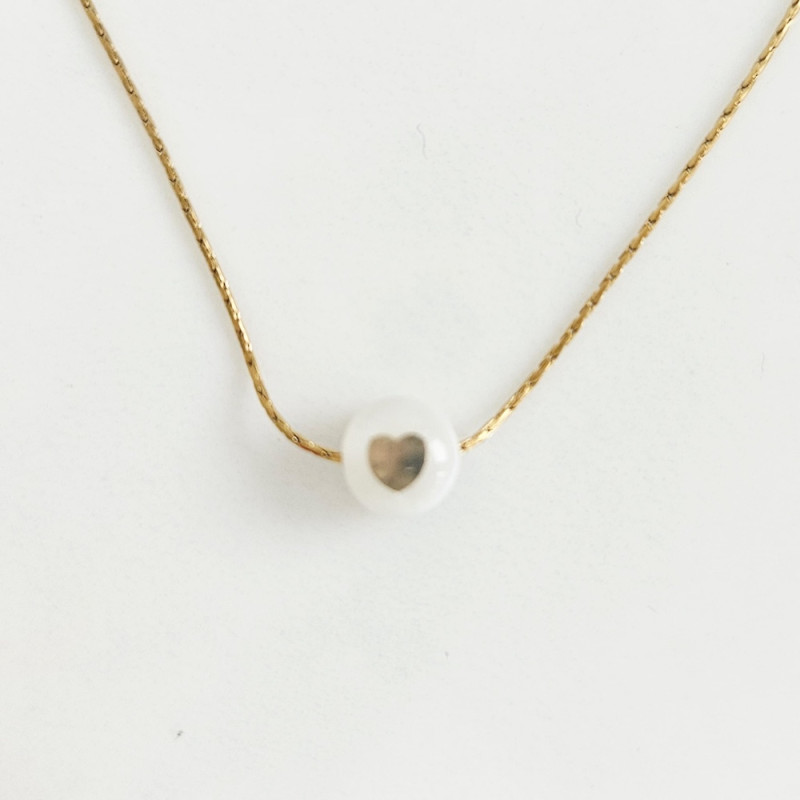 Collier coeur doré sur nacre