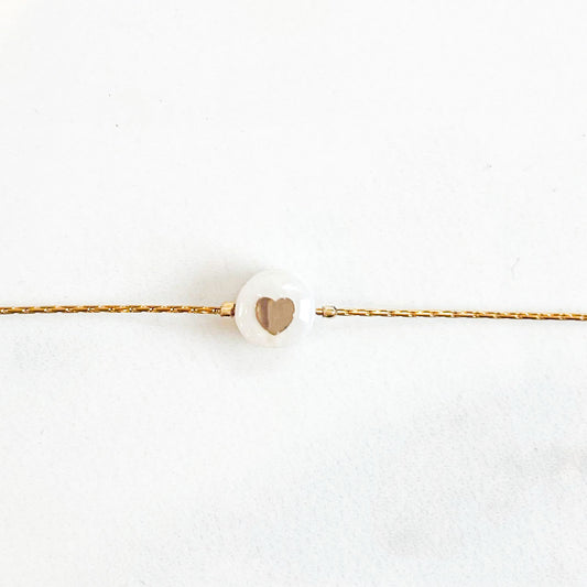 Bracelet coeur doré sur nacre